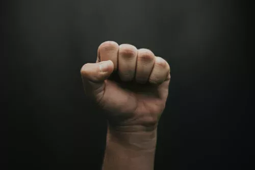 Clenched fists: a sign of resistance and will to fight